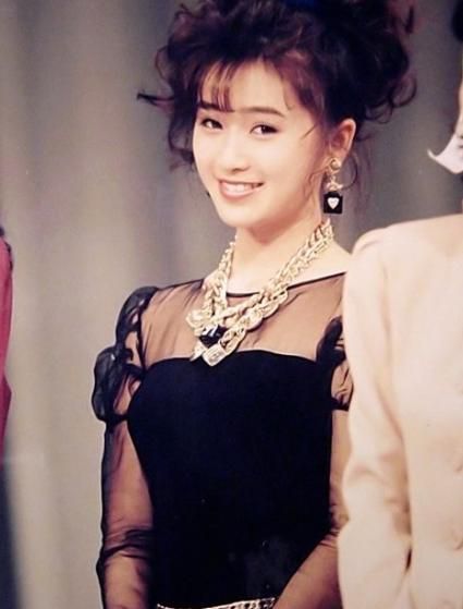 日本女星酒井法子湿身诱人写真