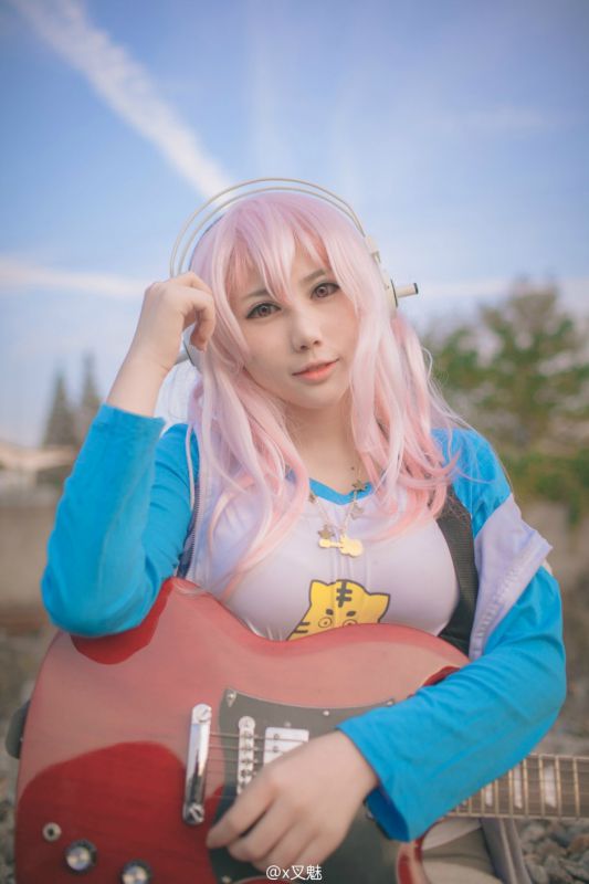 短发女模特x叉魅性感Cos写真图片