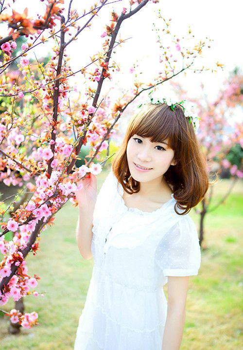 春日小清新美女桃花树下唯美写真