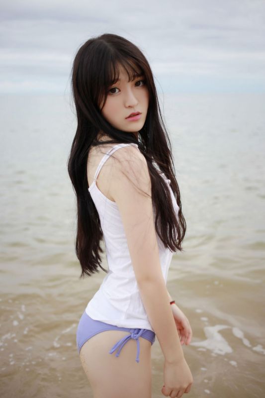 粉奶头特写沙滩萝莉美女吊带湿身极品透视性感写真