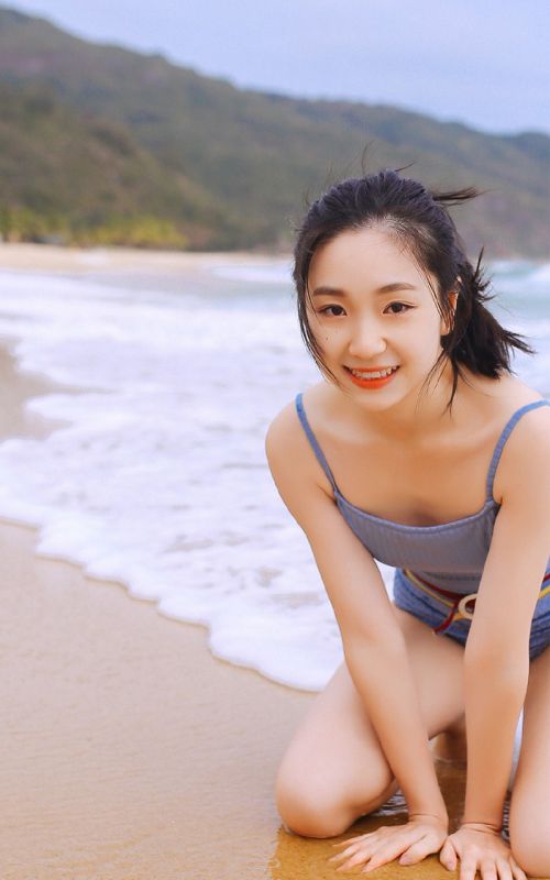 比基尼泳衣美女海边湿身吊带长腿爆乳性感诱惑写真