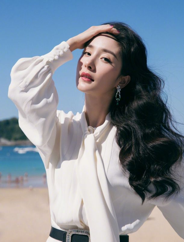 海边风情美女气质优雅迷人艳丽清纯图片